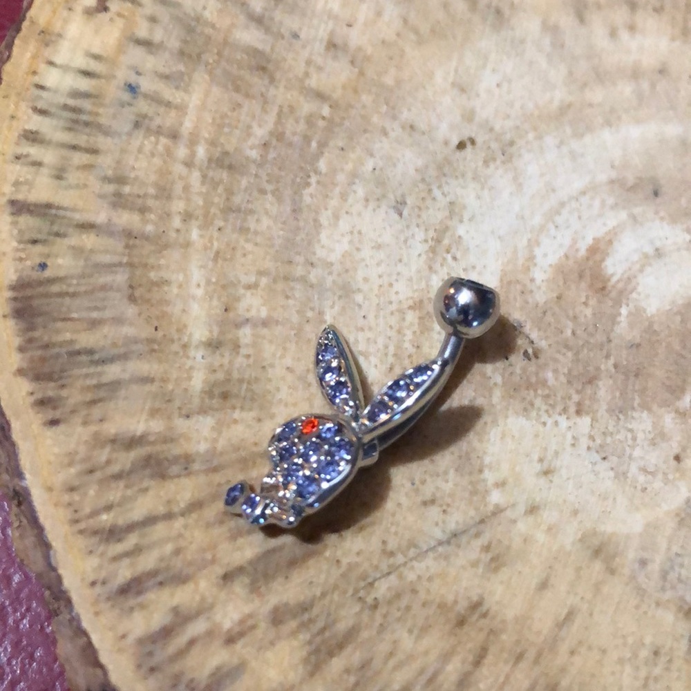 Playboy belly ring